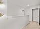 Hallway with neutral carpeting and storage area at 2476 Bayberry St, Acworth, GA 30101