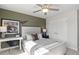 Bedroom with light grey bed frame and baseball decor at 336 Foxglove Way, Mcdonough, GA 30253