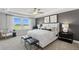 Luxurious main bedroom with king-size bed and en-suite bathroom at 336 Foxglove Way, Mcdonough, GA 30253