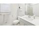 Simple bathroom with toilet, sink, and shower at 4169 Wood Fern Ln, Buford, GA 30519