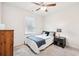 Well-lit bedroom with a double bed and ample floor space at 4169 Wood Fern Ln, Buford, GA 30519