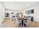 Bright kitchen featuring white cabinets and a spacious island at 4169 Wood Fern Ln, Buford, GA 30519