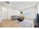 Comfortable living room with a neutral color palette at 4169 Wood Fern Ln, Buford, GA 30519