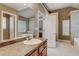 Bathroom with double sinks and a walk-in shower at 9265 Tara Sw Dr, Covington, GA 30014