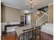 Dining room with hardwood floors and brick accent wall at 9265 Tara Sw Dr, Covington, GA 30014