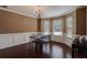 Formal dining room with hardwood floors and a chandelier at 9265 Tara Sw Dr, Covington, GA 30014