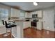 Kitchen with stainless steel appliances and granite countertops at 9265 Tara Sw Dr, Covington, GA 30014