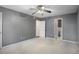 Bedroom with neutral paint, carpet, closet and ensuite bathroom at 1101 Collier Nw Rd # L3, Atlanta, GA 30318