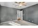 Bedroom with neutral paint, carpet, and closet and entrance doors at 1101 Collier Nw Rd # L3, Atlanta, GA 30318