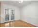 Bright dining area features hardwood floors and glass patio doors at 1101 Collier Nw Rd # L3, Atlanta, GA 30318