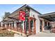 Exterior view of an industrial building with a covered patio area and decorative lights at 1101 Collier Nw Rd # L3, Atlanta, GA 30318