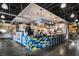 Counter shot of a restaurant, highlighting bar stool seating with colorful accents at 1101 Collier Nw Rd # L3, Atlanta, GA 30318