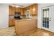 Kitchen featuring stainless steel appliances, ample cabinetry, and granite countertops at 1101 Collier Nw Rd # L3, Atlanta, GA 30318