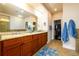 Double vanity bathroom with granite countertops and large walk-in shower at 1939 Ridgemont Ln, Decatur, GA 30033