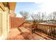 Relaxing deck with wooden railings, offering views of the surrounding trees at 1939 Ridgemont Ln, Decatur, GA 30033