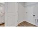 Bright laundry room with washer/dryer hookups and ample shelving at 2278 Jamin Bnd # 17, Lithonia, GA 30058