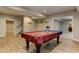 Finished basement with pool table and barn doors at 5032 Hickory Hills Dr, Woodstock, GA 30188