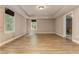 Spacious basement room with wood flooring at 5032 Hickory Hills Dr, Woodstock, GA 30188