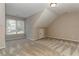 Well-lit bedroom with dormer windows at 5032 Hickory Hills Dr, Woodstock, GA 30188