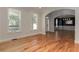 Bright dining room with hardwood floors and elegant blue and white wainscoting at 5032 Hickory Hills Dr, Woodstock, GA 30188