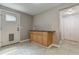 Main floor laundry room with built-in cabinets and granite countertop at 5032 Hickory Hills Dr, Woodstock, GA 30188