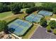 Community tennis courts with ample parking at 5032 Hickory Hills Dr, Woodstock, GA 30188