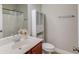 Small bathroom with single vanity, toilet, and shower/tub combo at 588 Myrtle Trace Ln, Suwanee, GA 30024