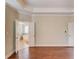 Bright bedroom with wood floors and an ensuite bathroom at 588 Myrtle Trace Ln, Suwanee, GA 30024