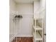 Walk-in closet with wire shelving and wood floor at 588 Myrtle Trace Ln, Suwanee, GA 30024