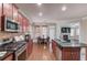 Spacious kitchen with stainless steel appliances and breakfast nook at 588 Myrtle Trace Ln, Suwanee, GA 30024