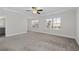 Primary bedroom with ceiling fan and large windows at 969 Rittenhouse Way, Atlanta, GA 30316