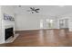 Spacious living room with hardwood floors, fireplace and a ceiling fan at 969 Rittenhouse Way, Atlanta, GA 30316