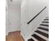 Elegant staircase with dark wood steps and white risers at 969 Rittenhouse Way, Atlanta, GA 30316