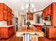 Gourmet kitchen with island, custom cabinetry, and stainless steel appliances at 1858 Windemere Ne Dr, Atlanta, GA 30324