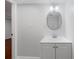 Basement bathroom with a vanity and oval mirror at 1362 Meadow Creek Nw Way, Acworth, GA 30102