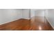 Finished basement with hardwood floors and neutral walls at 1362 Meadow Creek Nw Way, Acworth, GA 30102