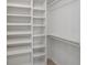 Large walk-in closet with ample shelving and hanging space at 1362 Meadow Creek Nw Way, Acworth, GA 30102