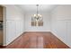 Formal dining room with hardwood floors and wainscoting at 1362 Meadow Creek Nw Way, Acworth, GA 30102