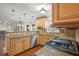 Well-lit kitchen features granite countertops, stainless steel appliances, and a decorative backsplash at 1362 Meadow Creek Nw Way, Acworth, GA 30102