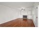 Living room with hardwood floors, fireplace, and built-in shelving at 1362 Meadow Creek Nw Way, Acworth, GA 30102