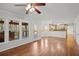 Open-concept living room with a view of the breakfast nook and the back deck at 1362 Meadow Creek Nw Way, Acworth, GA 30102