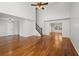 Open living room with hardwood floors and a view to the dining room at 1362 Meadow Creek Nw Way, Acworth, GA 30102