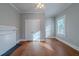 Hardwood floors and neutral walls in this bright bedroom at 1453 Graham Sw St, Atlanta, GA 30310