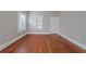 Spacious bedroom with hardwood floors and neutral walls at 1453 Graham Sw St, Atlanta, GA 30310