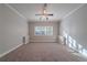 Spacious bedroom with ceiling fan and neutral decor at 1453 Graham Sw St, Atlanta, GA 30310