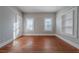 Bright bedroom with hardwood floors and built-in shelving at 1453 Graham Sw St, Atlanta, GA 30310