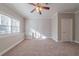 Bright bedroom with ceiling fan and large windows at 1453 Graham Sw St, Atlanta, GA 30310