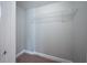 Walk-in closet with wire shelving for hanging clothes at 1453 Graham Sw St, Atlanta, GA 30310