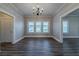 Bright dining room with hardwood floors and chandelier at 1453 Graham Sw St, Atlanta, GA 30310