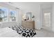 Bright bedroom with lots of natural light, stylish furniture, and calming colors at 1603 Caldwell Bend Ln, Dacula, GA 30019